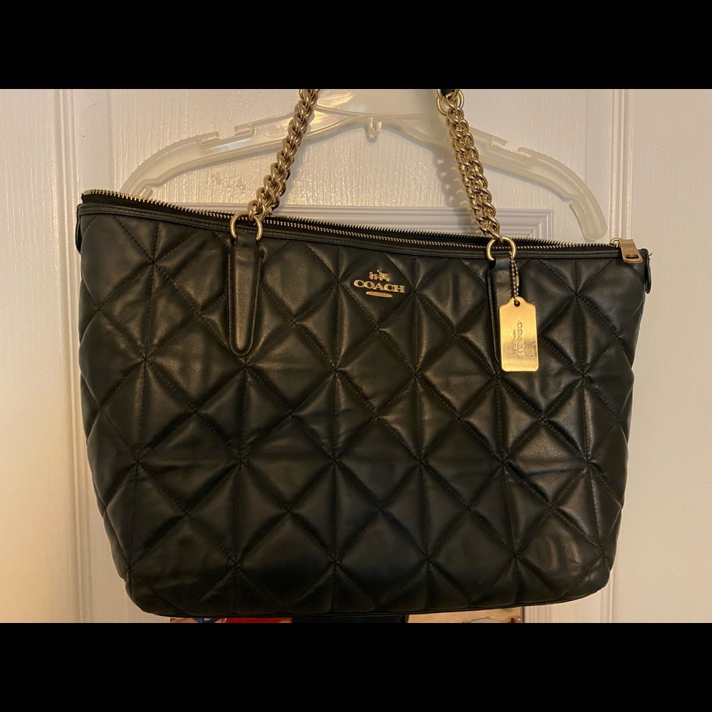Black and gold coach purse